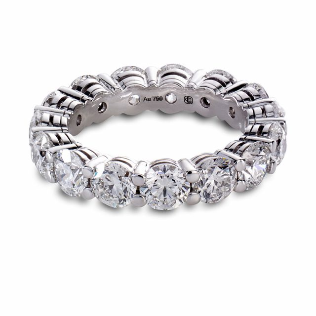 Eternity ring in white gold set with round brilliant cut white diamonds