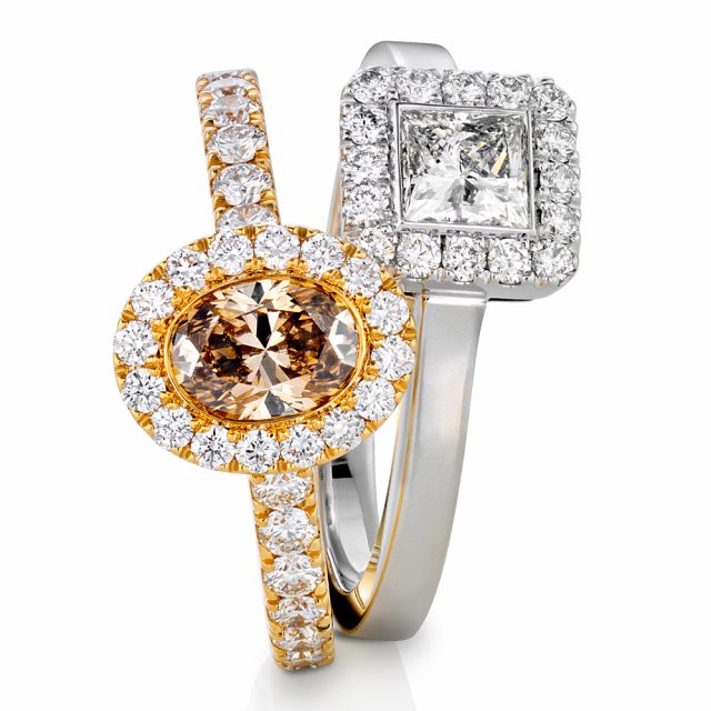 MILESTONE rings in yellow and white gold with champagne colored and white diamonds