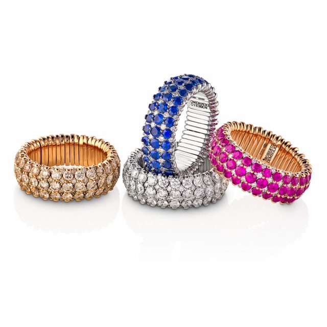 Giotto stretch rings in gold with diamonds, sapphire and rubies