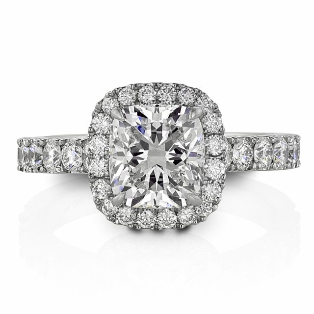 Engagement ring in platinum with cushion and brilliant cut diamonds