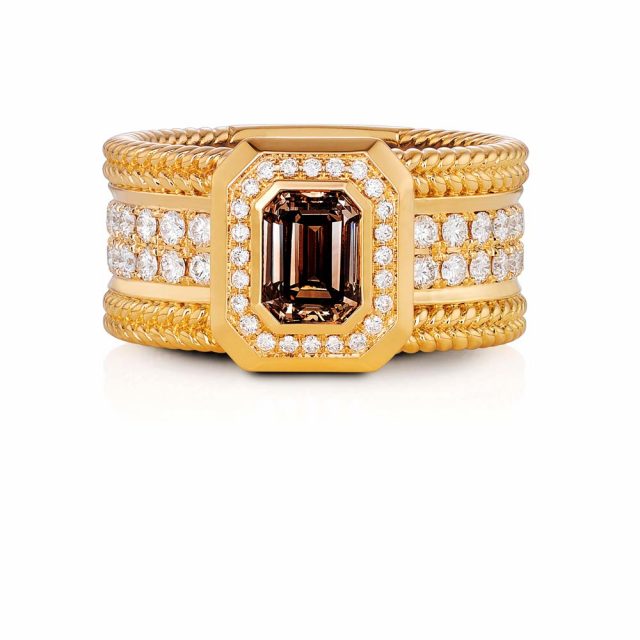 Twisted Exclusive ring large with emerald cut champagne colored diamond