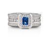 Twisted Exclusive ring in 18kt white gold with emerald cut london blue topas