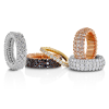 Stretch rings in 18 KT white, rose, and yellow gold with diamonds.