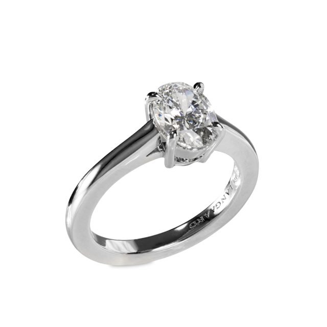 Enstensring i platina med oval diamant og armbånd i hvitt gull med briljanter