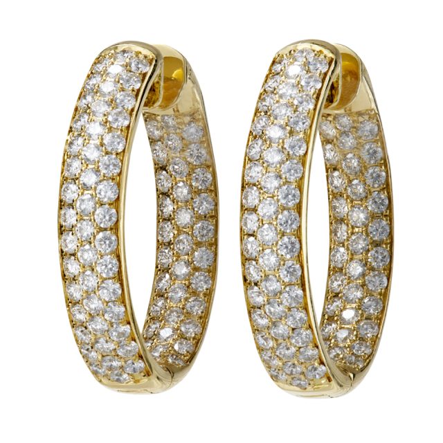 Ovale creoler i gult gull med briljanter